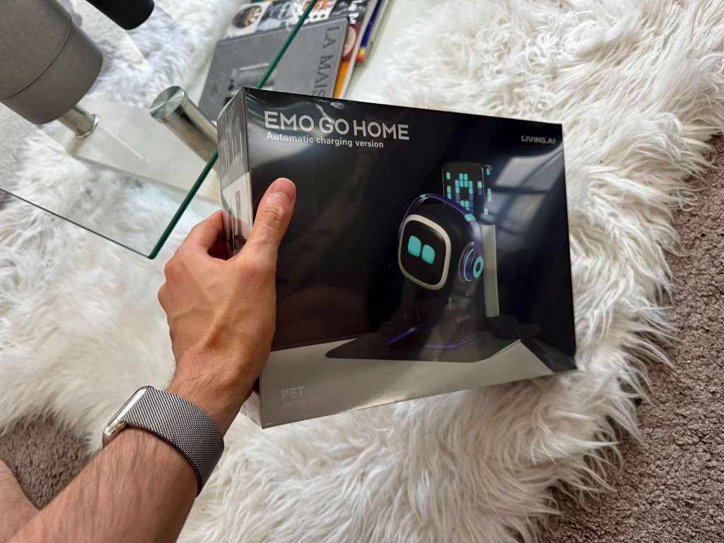 Edwin Franco holding EMO Go Home box